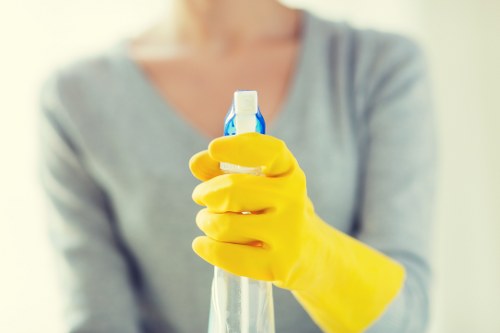 Cleaning professional reviewing a site risk assessment before work