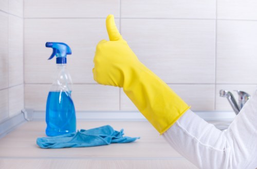 Greenwich Cleaner staff following safe cleaning procedures